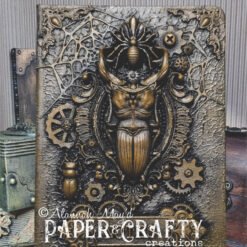 a5 notebook with skulls and wings